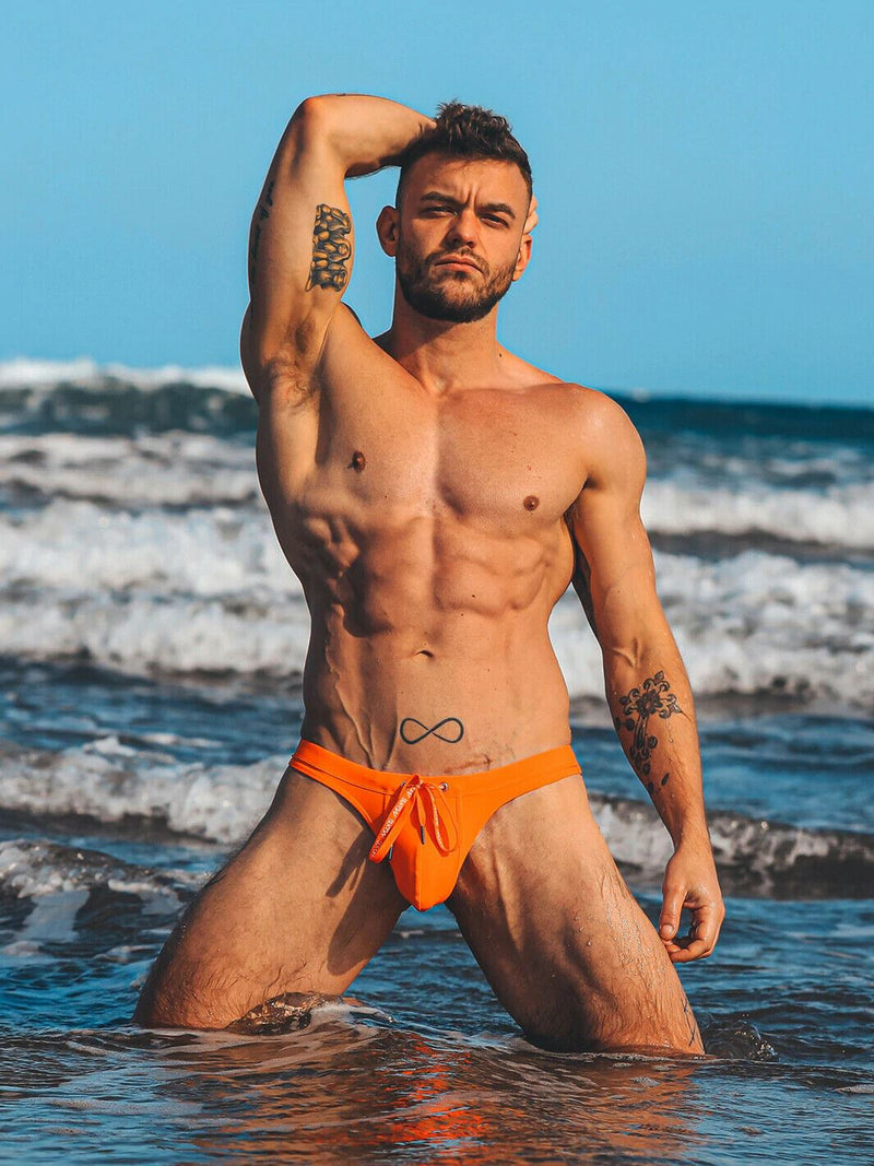 SUKREW Swim Thongs TORRENT Rounded Contour Pouch Flexible Swimwear Tangerine 36